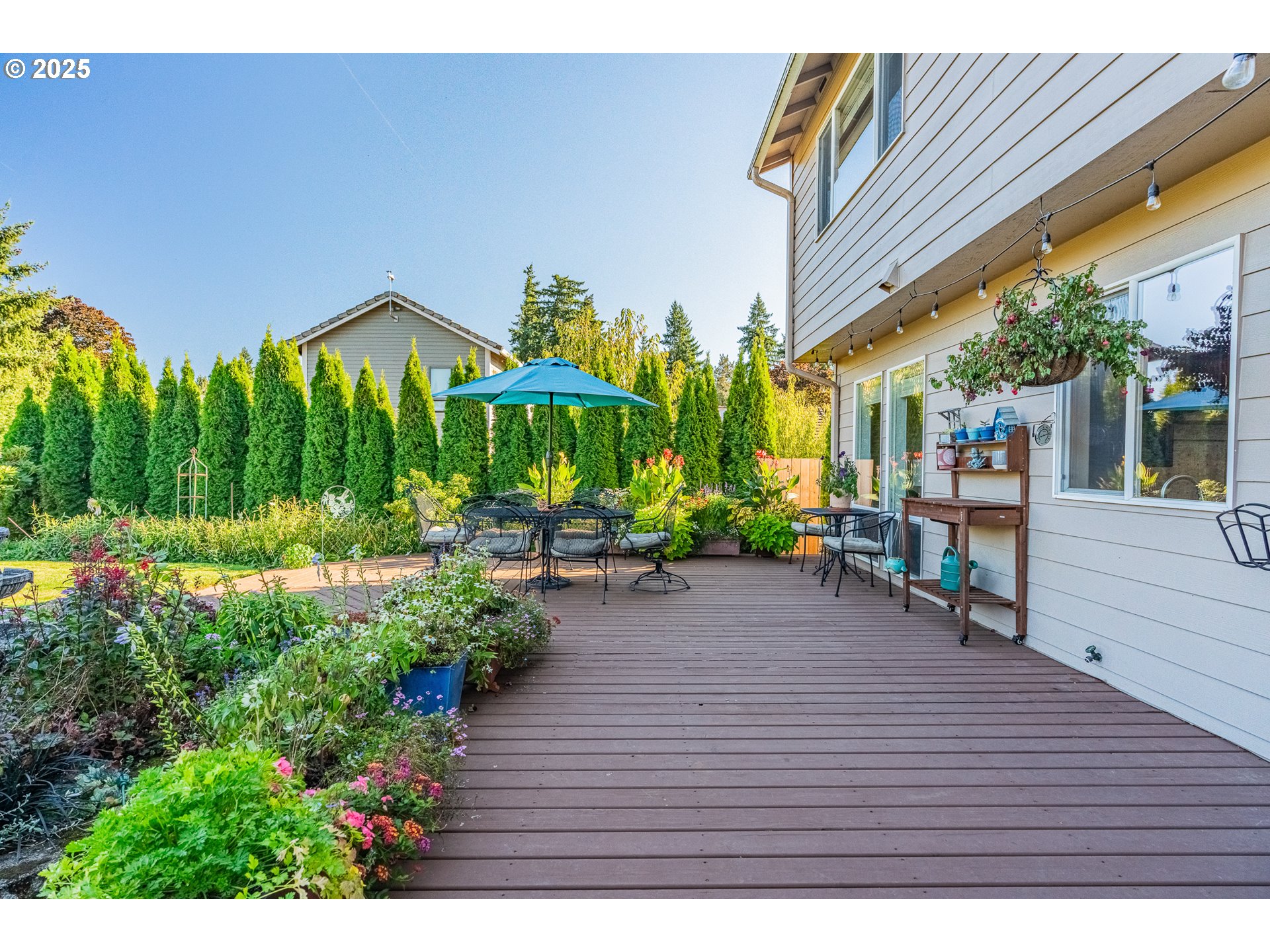 20194 Canyon Ridge Drive Oregon City, OR 97045 - Photo 31 of 41 a view of a house with porch and garden
