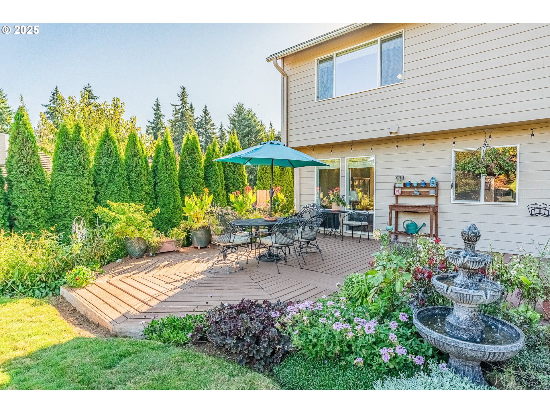 20194 Canyon Ridge Drive Oregon City, OR 97045 - Photo 33 of 41 a view of a backyard with plants and a patio