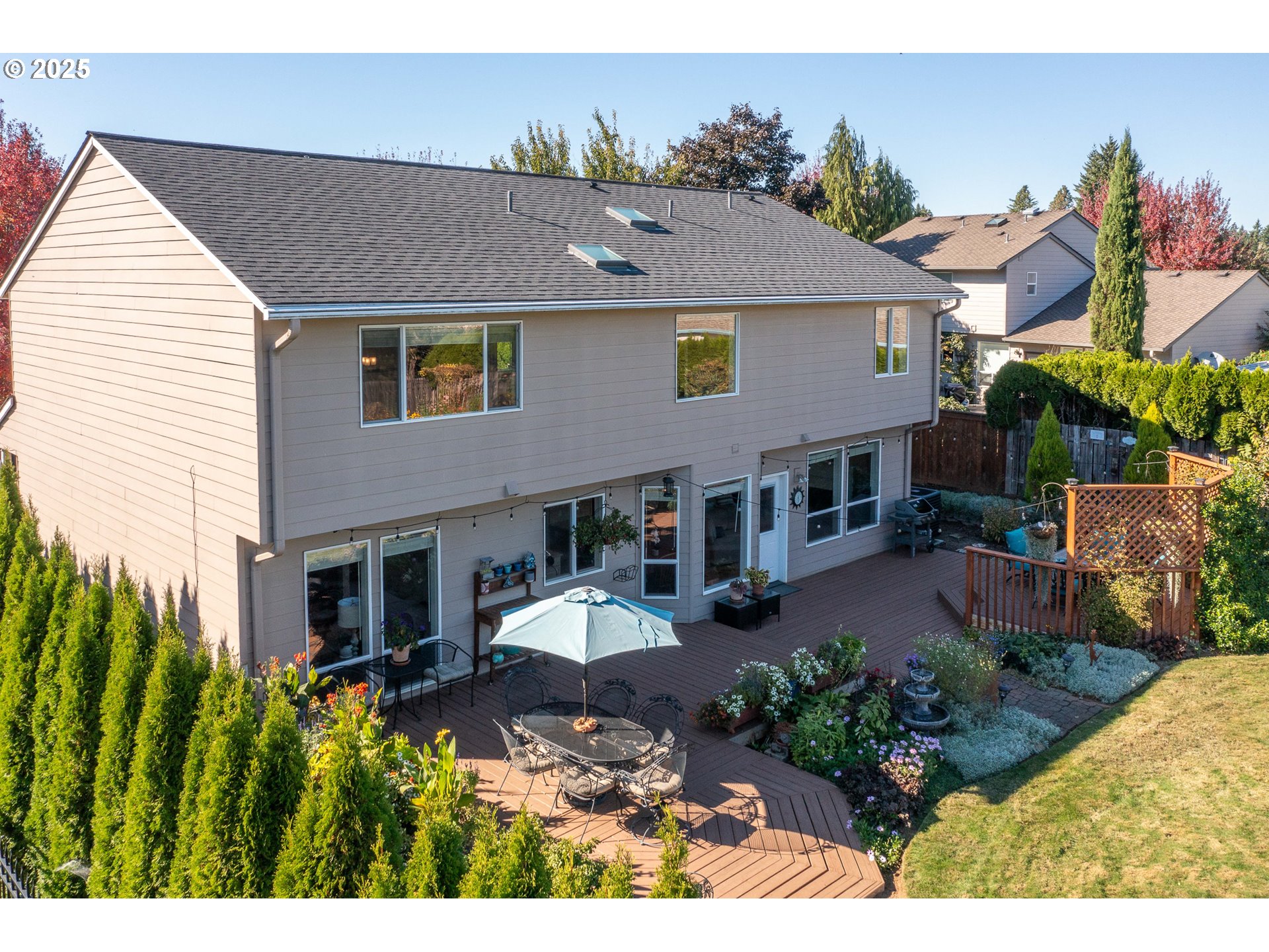 20194 Canyon Ridge Drive Oregon City, OR 97045 - Photo 37 of 41 a aerial view of a house with table and chairs in patio