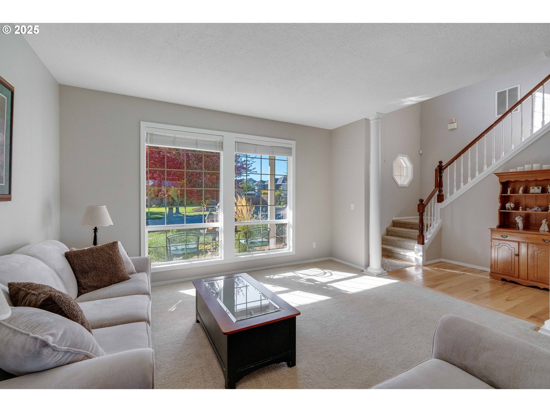 20194 Canyon Ridge Drive Oregon City, OR 97045 - Photo 5 of 41 a living room with furniture and a large window