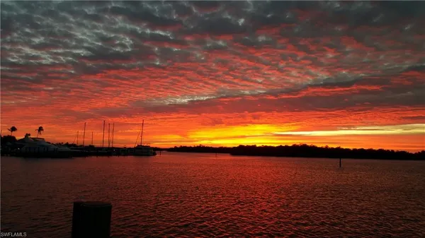 a view of an ocean from sunset