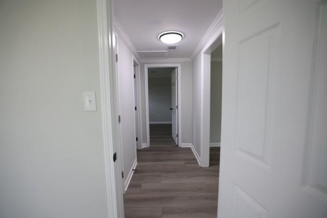 4006 North Arnold Mill Road Woodstock, GA 30188 - Photo 7 of 18 a view of a hallway with wooden floor and closet