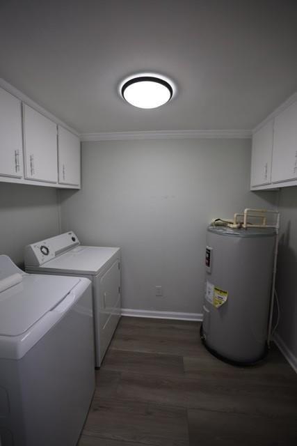 4006 North Arnold Mill Road Woodstock, GA 30188 - Photo 9 of 18 a utility room with wooden floor washer and dryer