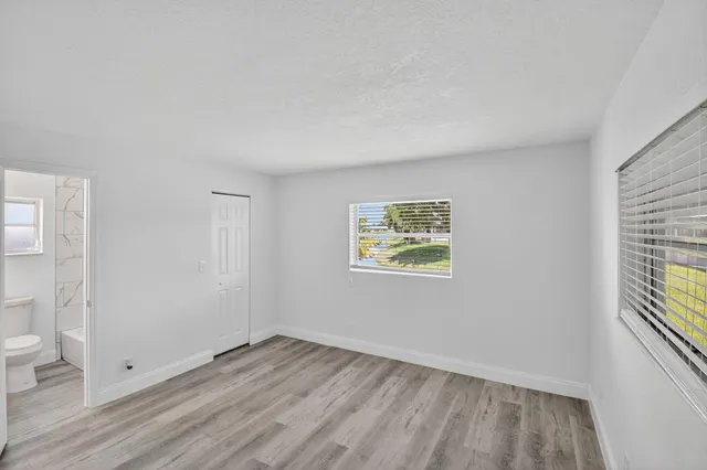 an empty room with windows