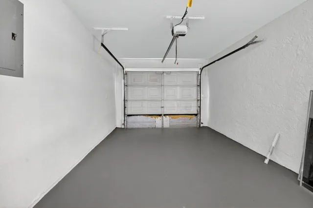 a view of empty room with fireplace