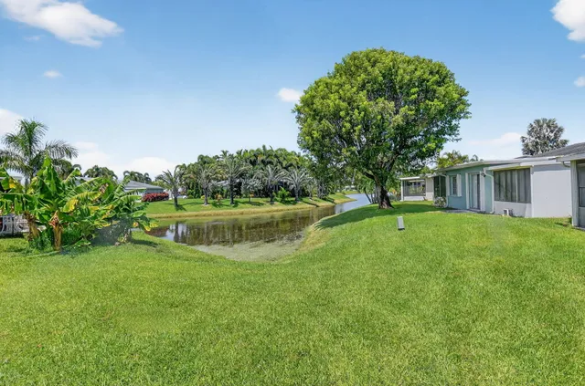 a view of a house with a swimming pool