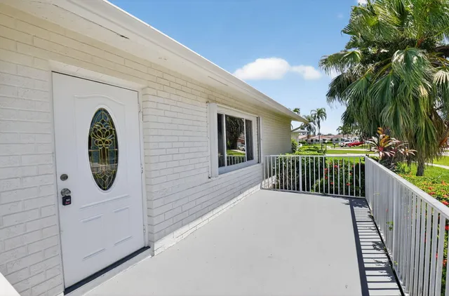 a view of a garden from a balcony