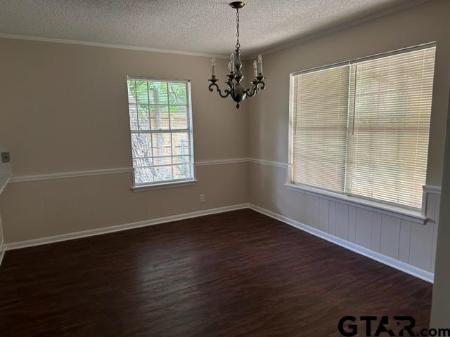 2611 South Boldt Avenue Tyler, TX 75701 - Photo 5 of 14 a view of an empty room with wooden floor and a window