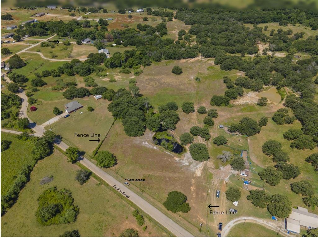 an aerial view of residential house with swimming pool