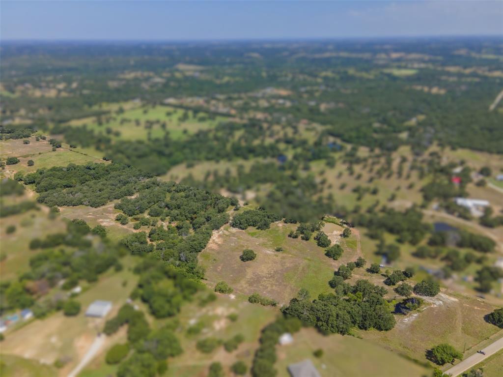 Undisclosed Address Springtown, TX 76082 - Photo 2 of 30 a view of a lake with a mountain
