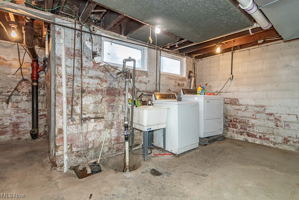 29396 Detroit Road Westlake, OH 44145 - Photo 29 of 30 Basement featuring washing machine and clothes dryer