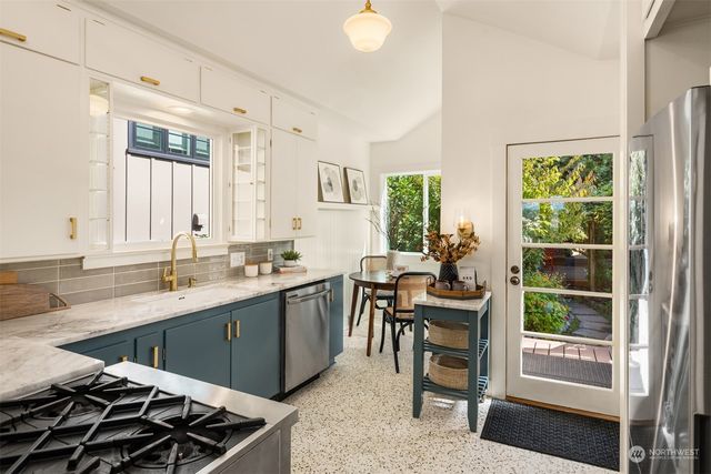 a view of a kitchen area with furniture and window