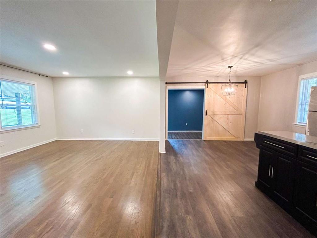 811 Cinderella Way Decatur, GA 30033 - Photo 12 of 33 an empty room with wooden floor and window