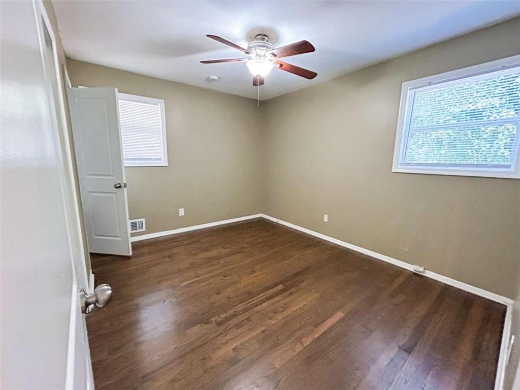 811 Cinderella Way Decatur, GA 30033 - Photo 18 of 33 wooden floor in an empty room with a window