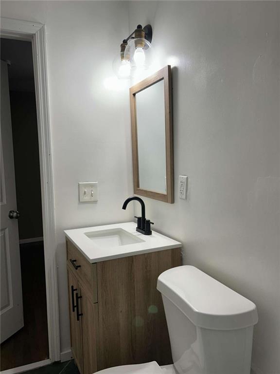 811 Cinderella Way Decatur, GA 30033 - Photo 21 of 33 a bathroom with a toilet sink and mirror