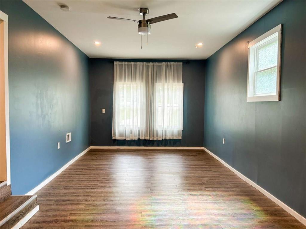 811 Cinderella Way Decatur, GA 30033 - Photo 26 of 33 a view of an empty room with wooden floor and a window