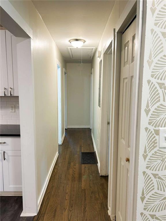 811 Cinderella Way Decatur, GA 30033 - Photo 32 of 33 a view of a hallway with wooden floor and closet