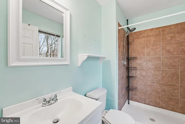 a view of empty room with fan