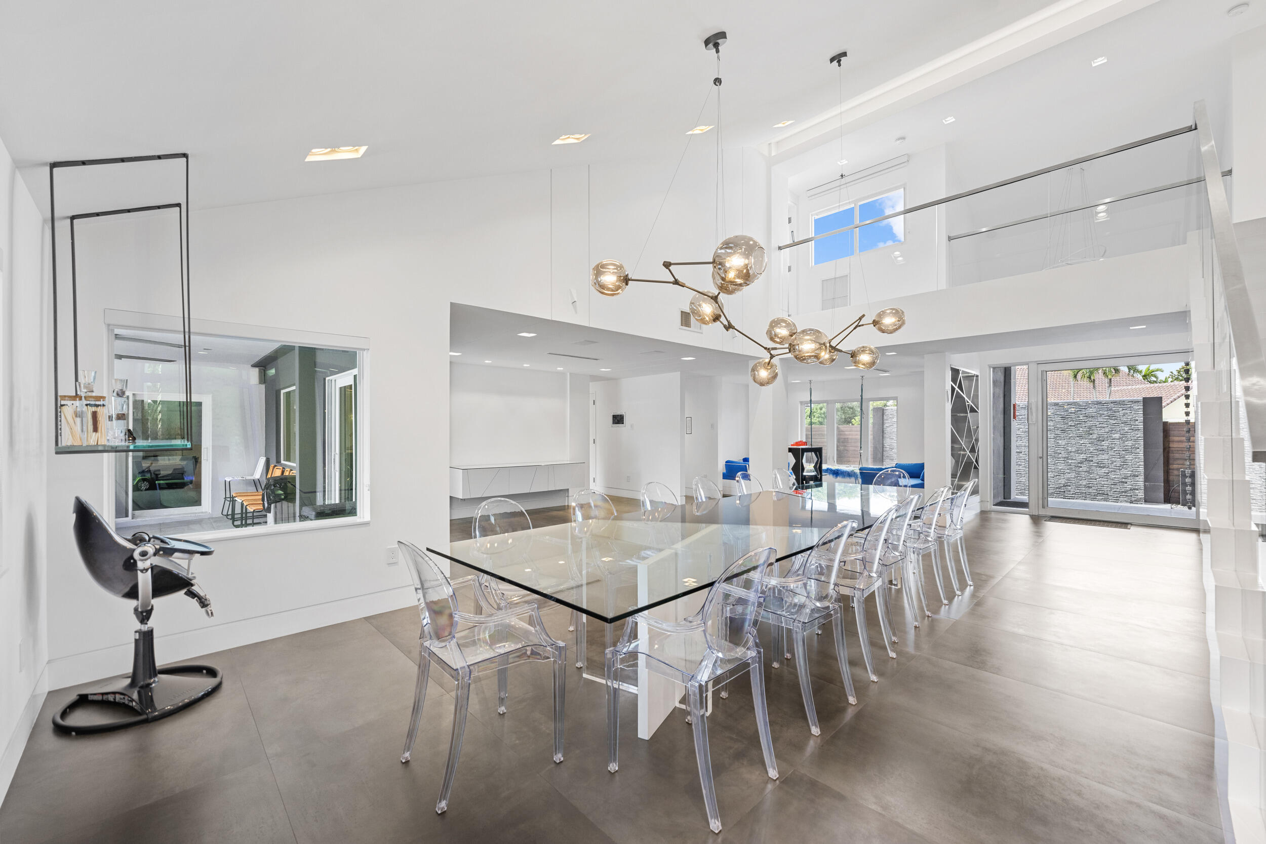 7047 San Sebastian Circle Boca Raton, FL 33433 - Photo 11 of 95 a view of a dining room with furniture and a large window