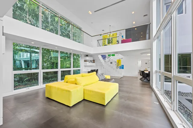 a bathroom with a shower sink and mirror