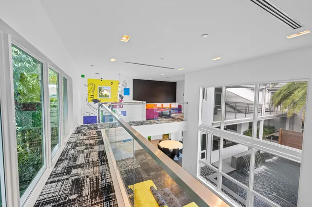 a view of a house with a swimming pool