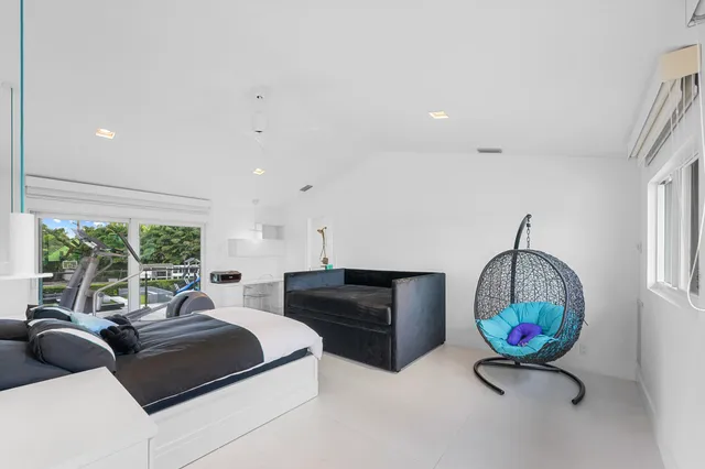 a view of a garden with sitting area