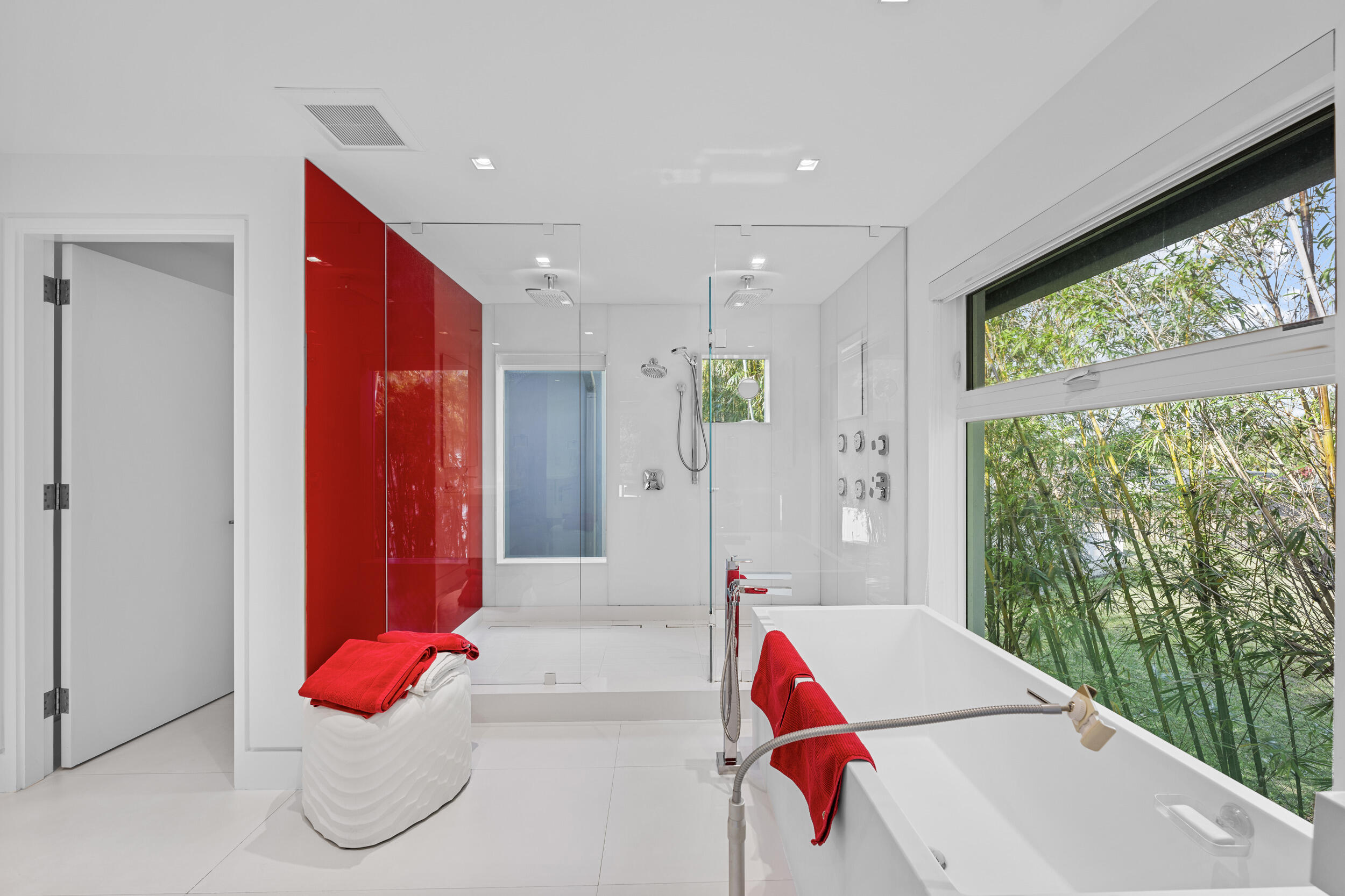 7047 San Sebastian Circle Boca Raton, FL 33433 - Photo 37 of 95 a bedroom with furniture and a large window