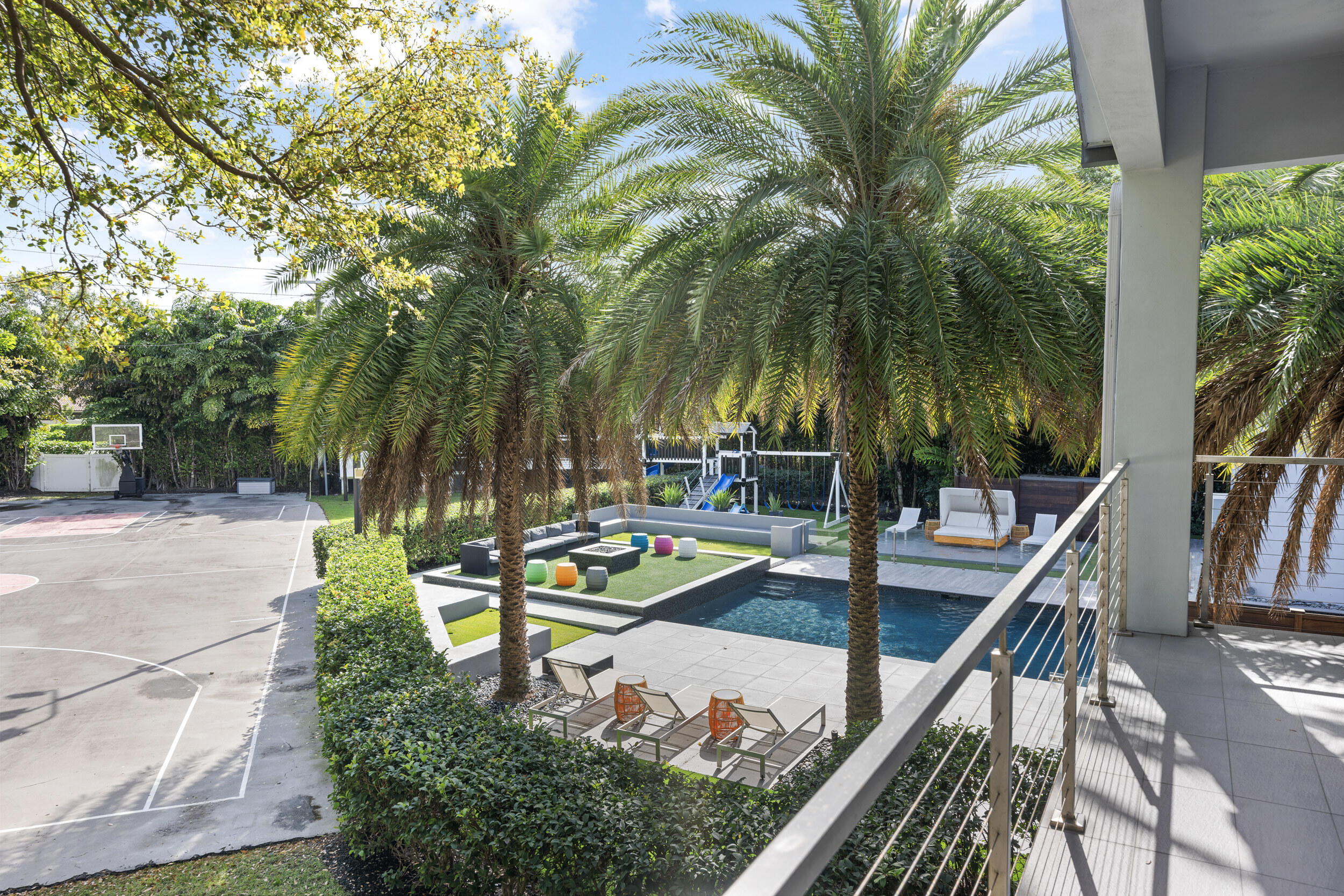 7047 San Sebastian Circle Boca Raton, FL 33433 - Photo 41 of 95 a view of a swimming pool with a patio