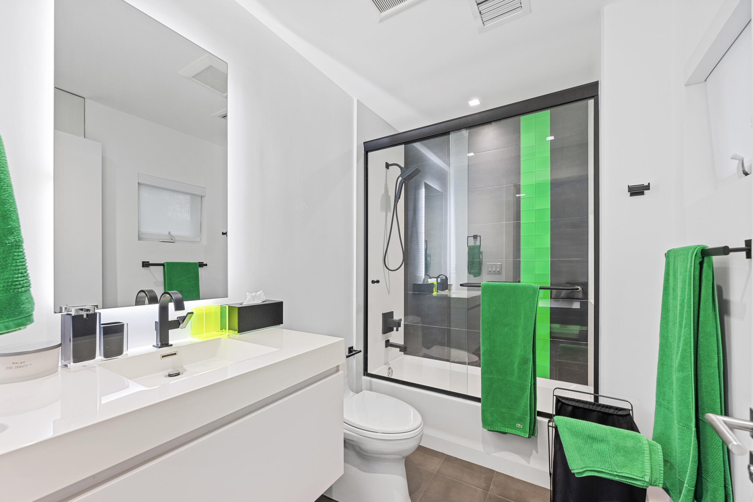 7047 San Sebastian Circle Boca Raton, FL 33433 - Photo 50 of 95 a bathroom with a sink a toilet and shower