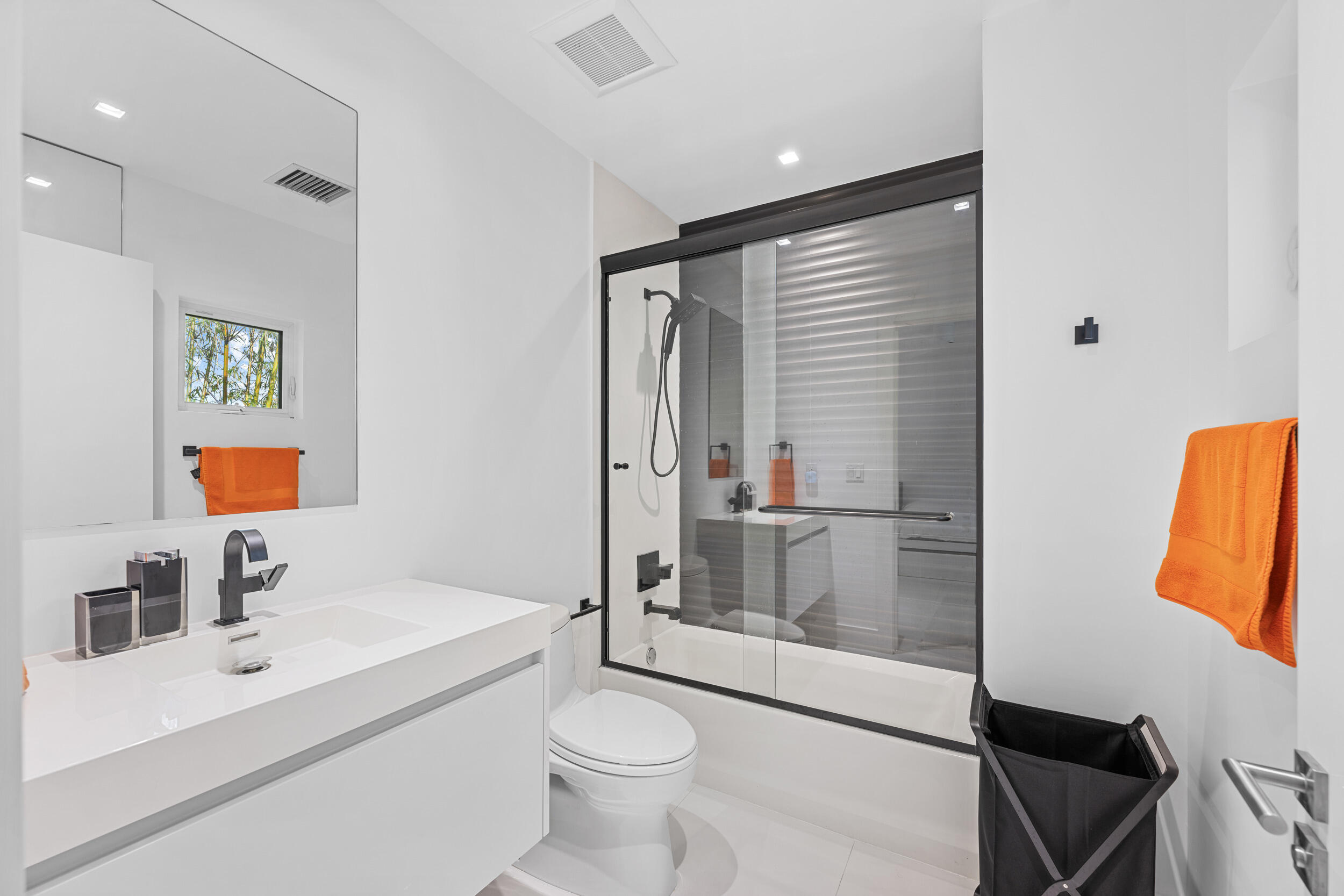 7047 San Sebastian Circle Boca Raton, FL 33433 - Photo 52 of 95 a bathroom with a sink a toilet and shower