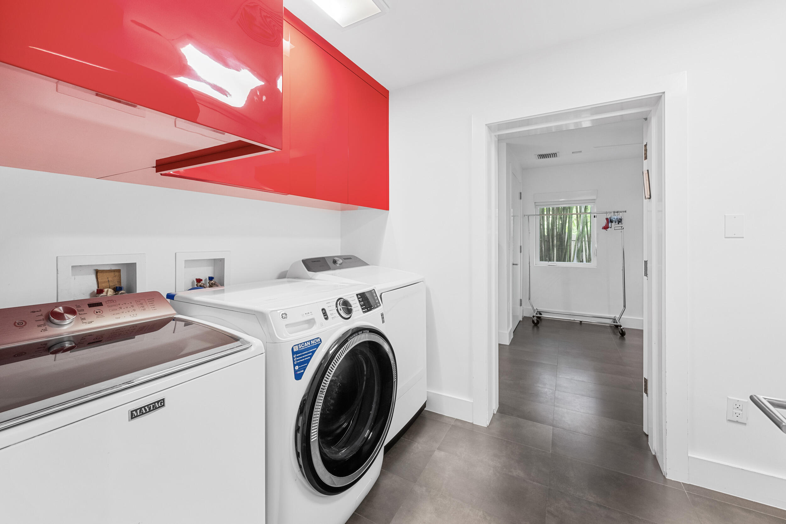 7047 San Sebastian Circle Boca Raton, FL 33433 - Photo 56 of 95 a view of storage and utility room with washer and dryer