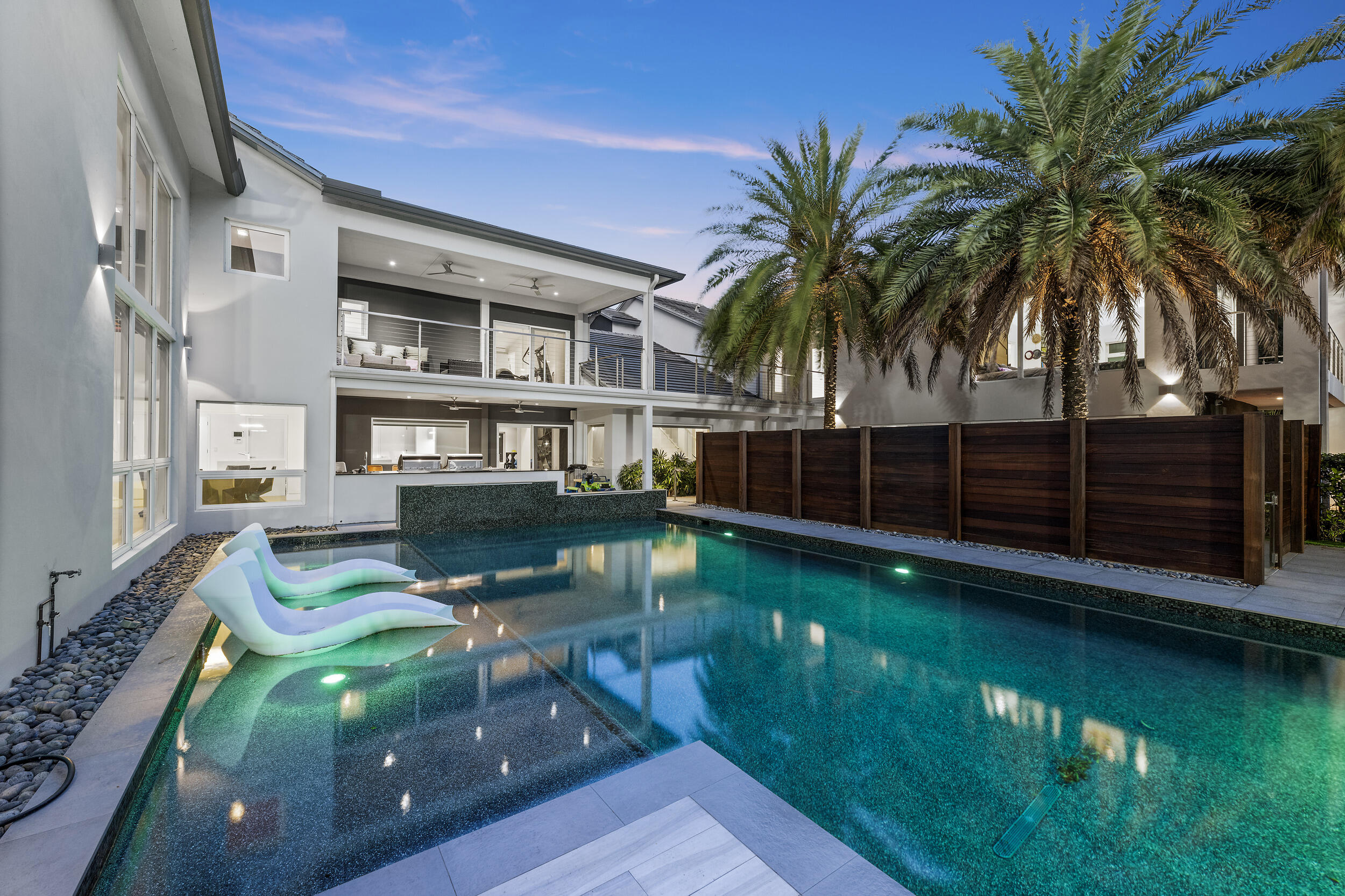 7047 San Sebastian Circle Boca Raton, FL 33433 - Photo 65 of 95 a view of a house with a swimming pool