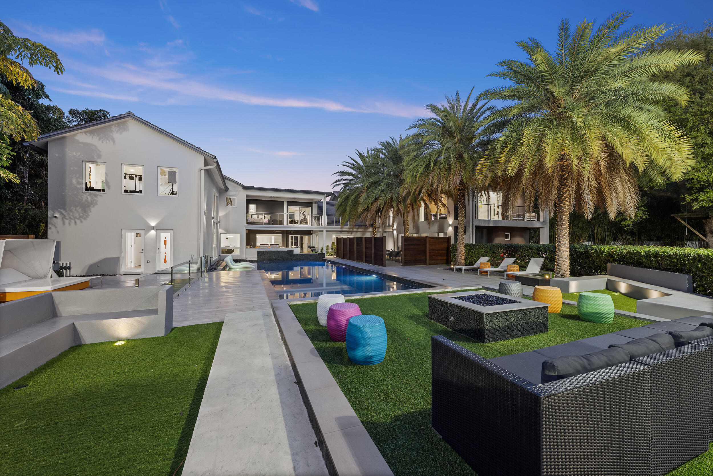 7047 San Sebastian Circle Boca Raton, FL 33433 - Photo 67 of 95 a view of a backyard with swimming pool and chairs