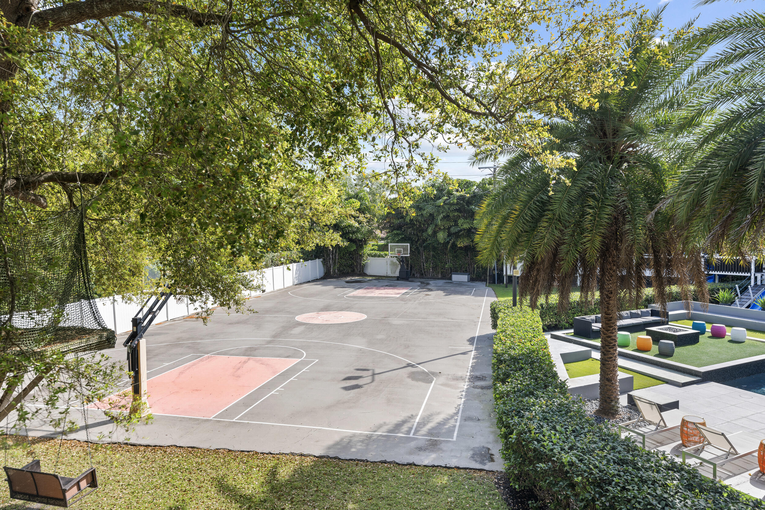 7047 San Sebastian Circle Boca Raton, FL 33433 - Photo 83 of 95 a backyard of a house with yard and outdoor seating
