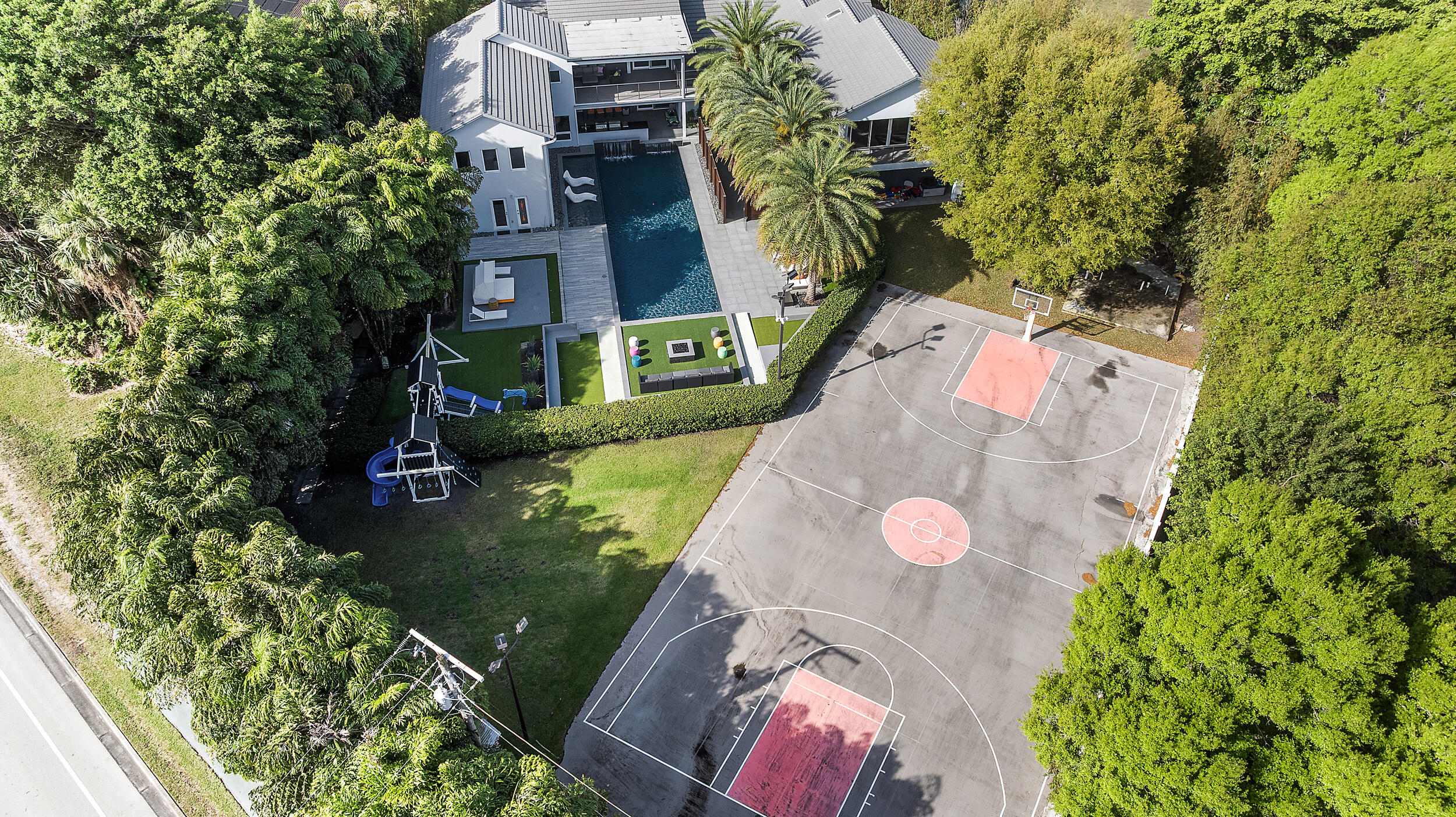 7047 San Sebastian Circle Boca Raton, FL 33433 - Photo 85 of 95 an aerial view of a house with a yard and swimming pool