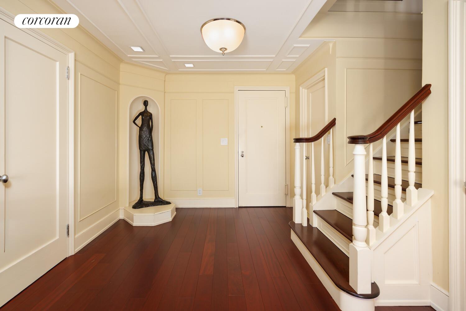870 5th Avenue, Unit 10/11B Manhattan, NY 10065 - Photo 6 of 14 a view of a room with wooden floor