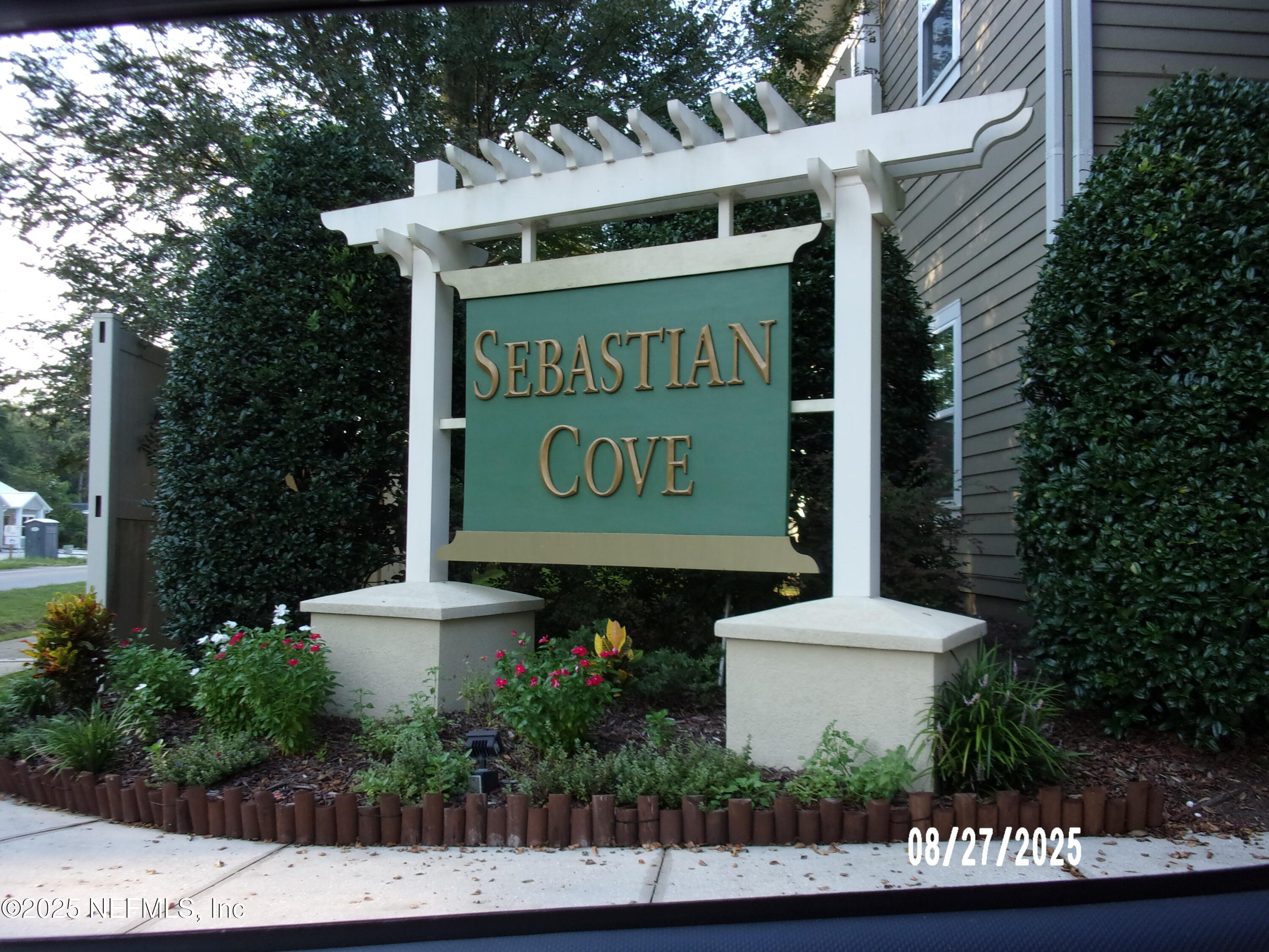 2871 Golden Lake Loop St. Augustine, FL 32084 - Photo 2 of 10 a sign on the side of a building