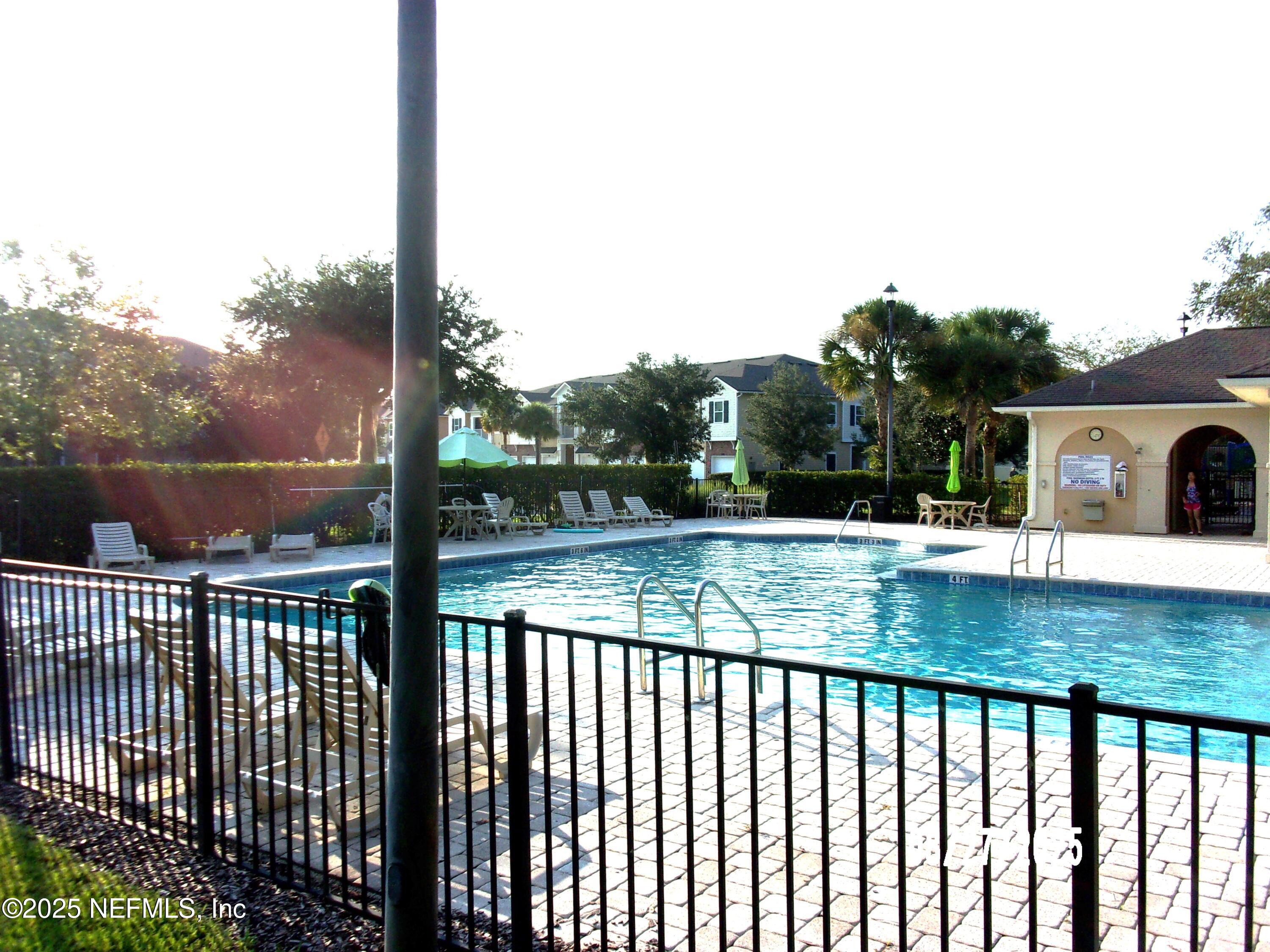 2871 Golden Lake Loop St. Augustine, FL 32084 - Photo 8 of 10 a view of swimming pool from a balcony