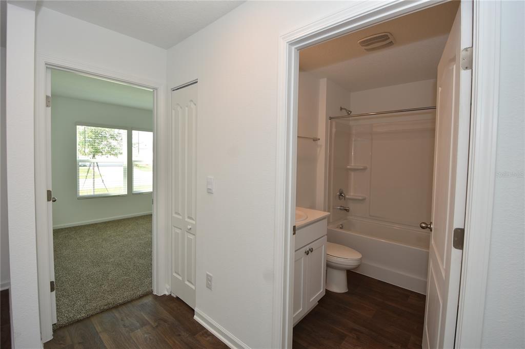 9 Springwood Drive Palm Coast, FL 32137 - Photo 21 of 29 a bathroom with a toilet