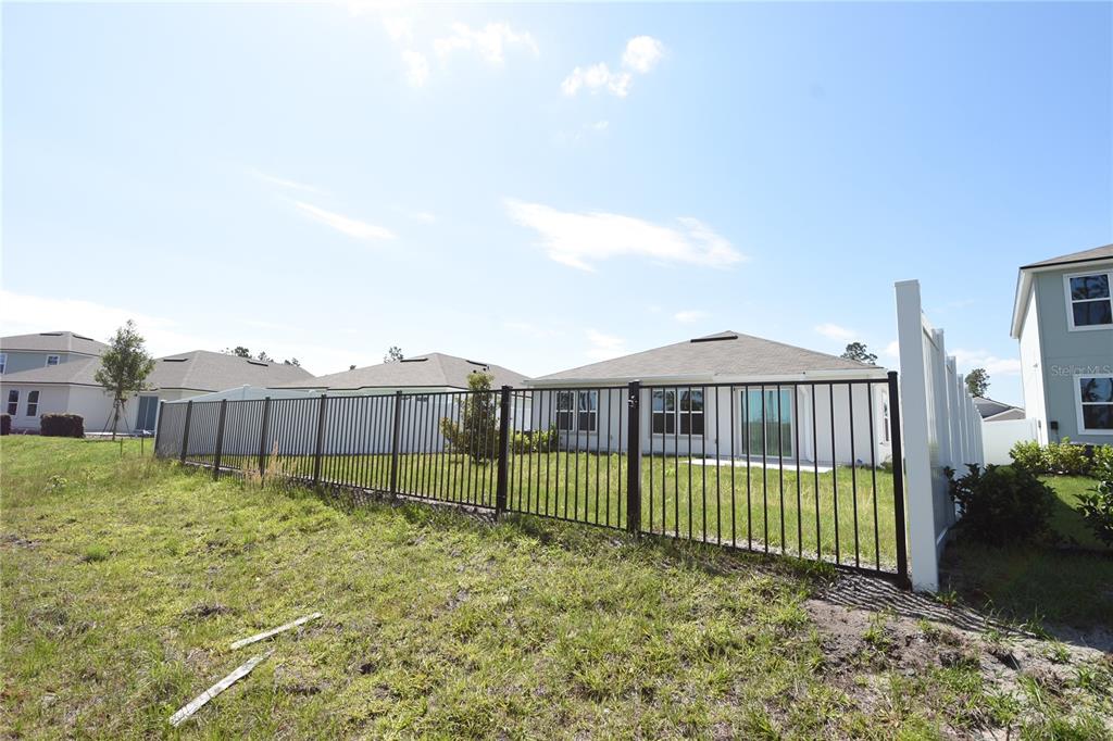 9 Springwood Drive Palm Coast, FL 32137 - Photo 29 of 29 a view of a garden