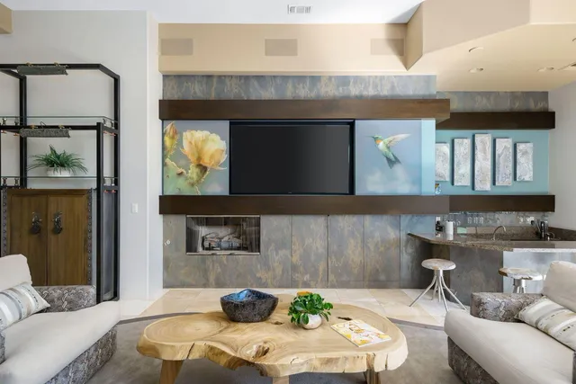 a living room with furniture and a window