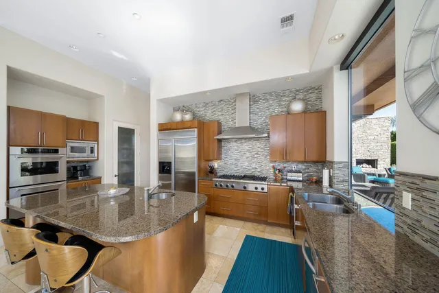 a outdoor space with patio furniture and potted plants