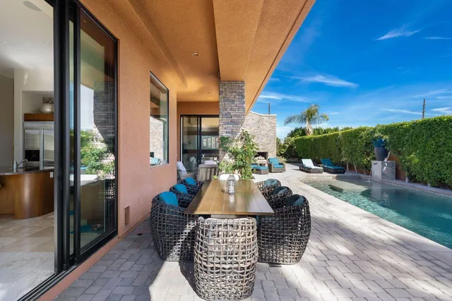 a view of backyard with plants and garden