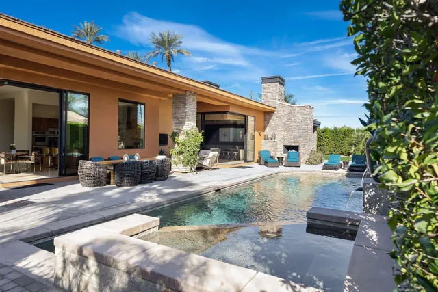a bathroom with a sink double vanity and a mirror