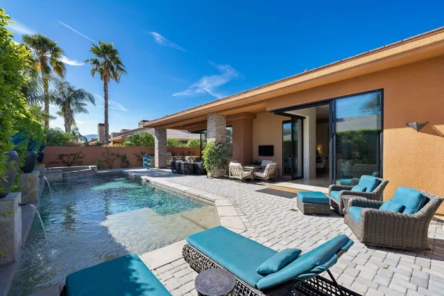 a view of workspace with furniture and windows