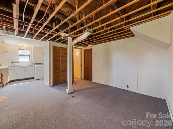 a view of a kitchen with cabinets