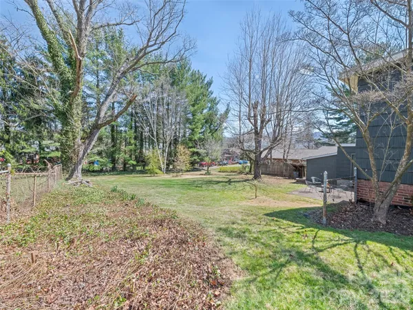 a view of backyard with green space