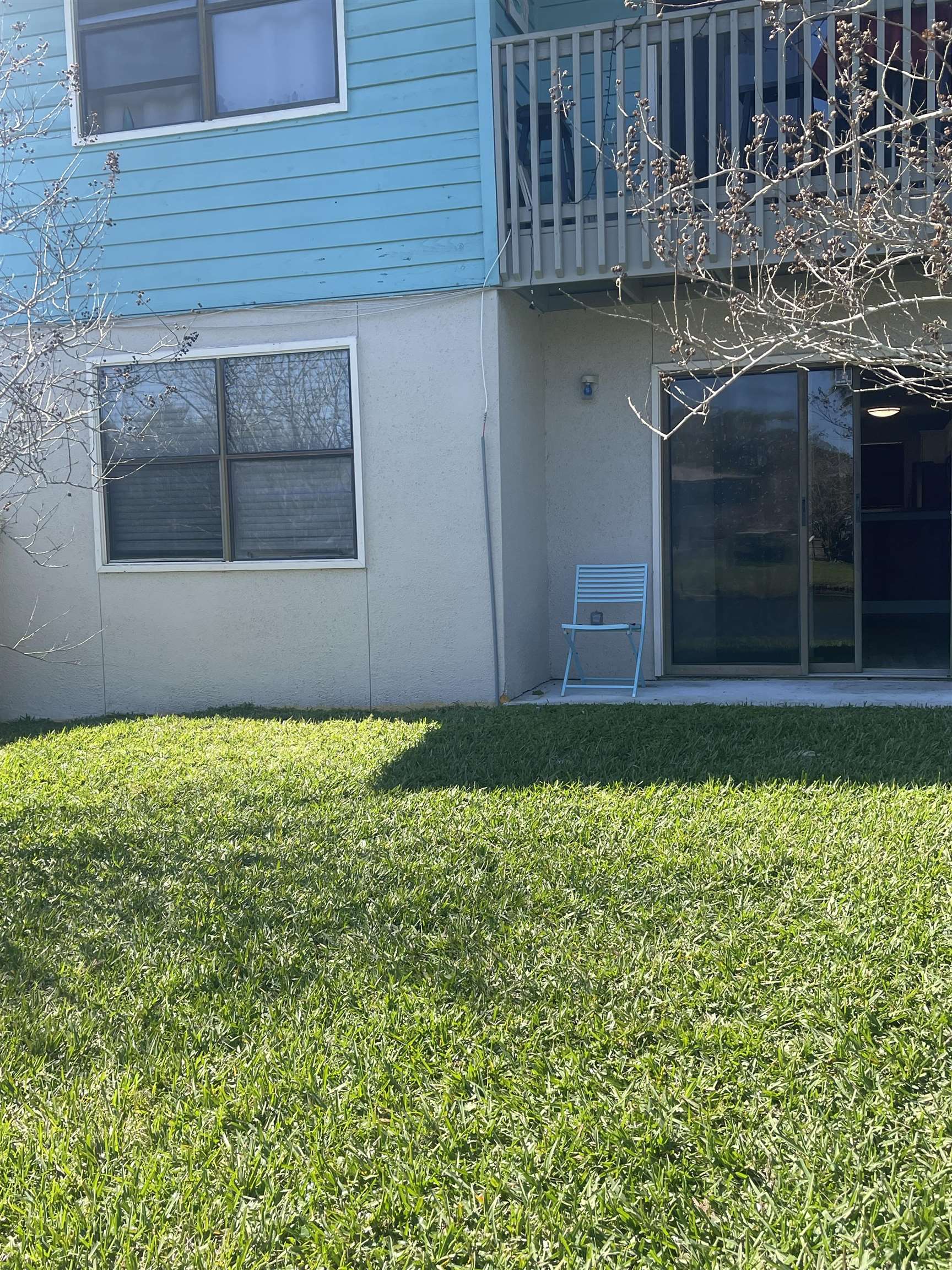 650 West Pope Road, Unit 276 St. Augustine, FL 32080 - Photo 6 of 15 a view of backyard with tub and wooden fence