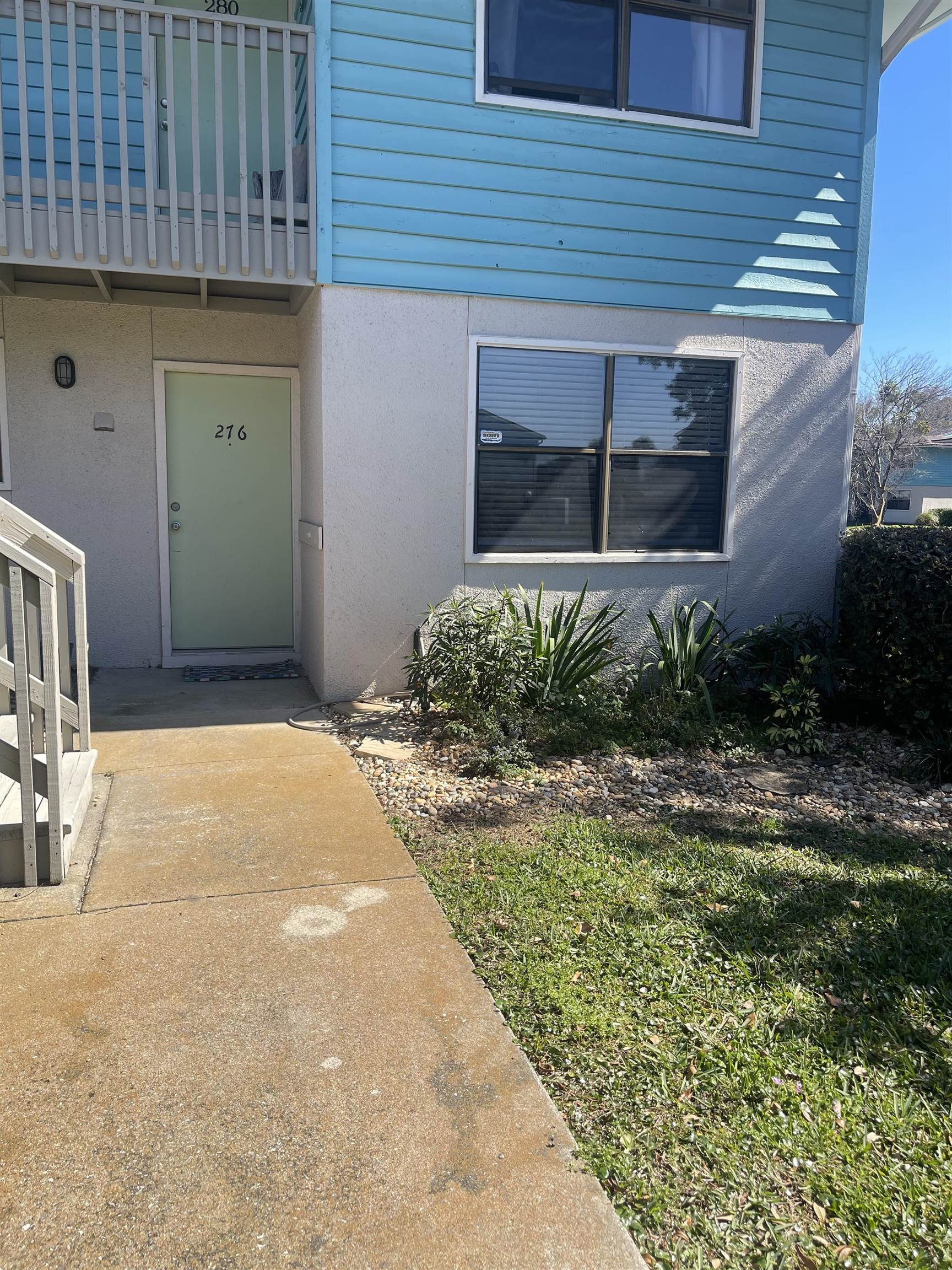 650 West Pope Road, Unit 276 St. Augustine, FL 32080 - Photo 7 of 15 a front view of a house with a yard