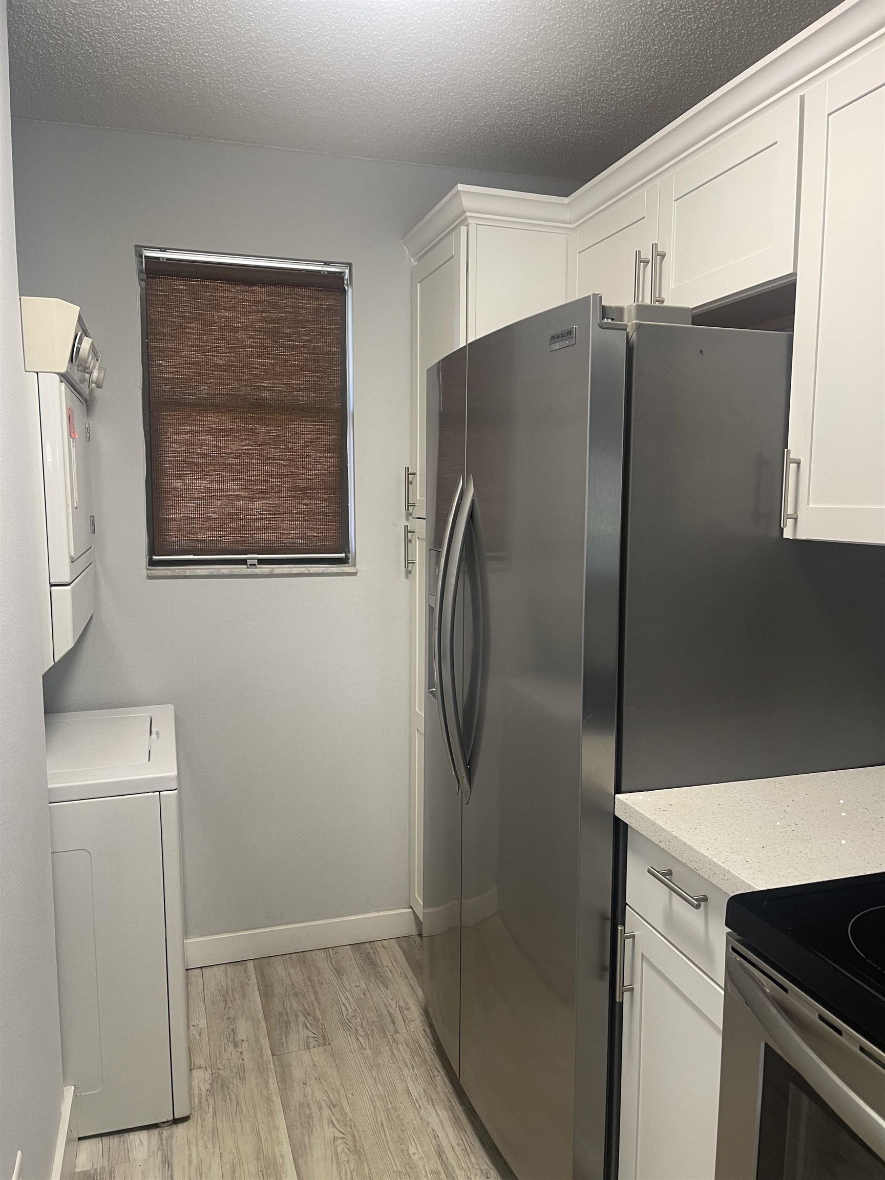 650 West Pope Road, Unit 276 St. Augustine, FL 32080 - Photo 10 of 15 a metallic refrigerator freezer sitting in a kitchen